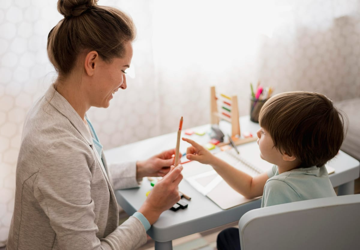 Child participating in pediatric speech, occupational, and physical therapy session with therapist at rehabilitation clinic in Texas